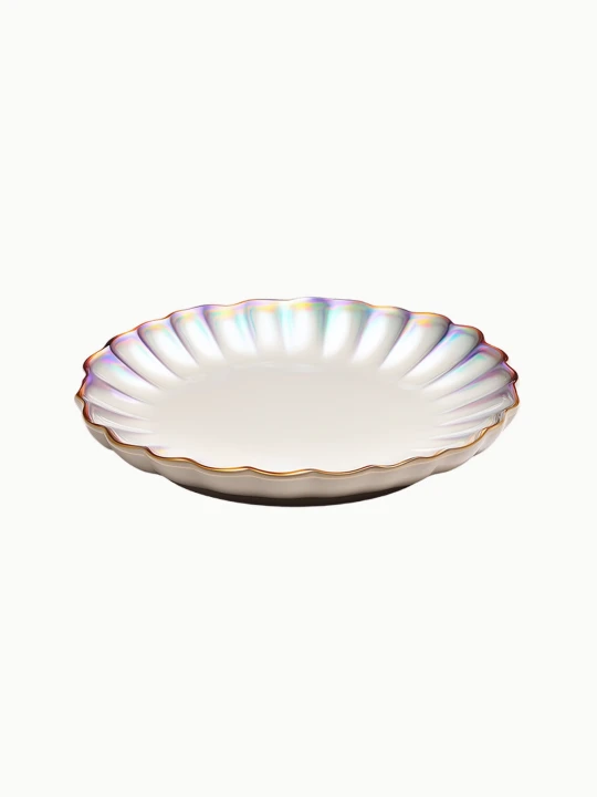A round glass plate featuring a pleated, scalloped border with an iridescent, rainbow-like shimmer and a gold rim.